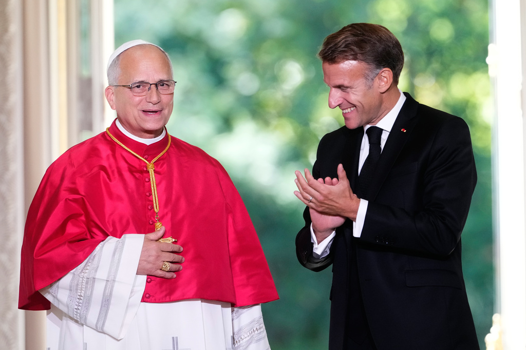 Pope Leo XIV, left, and French President Emmanuel Macron, attend a joint statement at the Elysee Palace, Friday, Sept. 25, 2026. (AP Photo/Teresa Suarez, Pool)