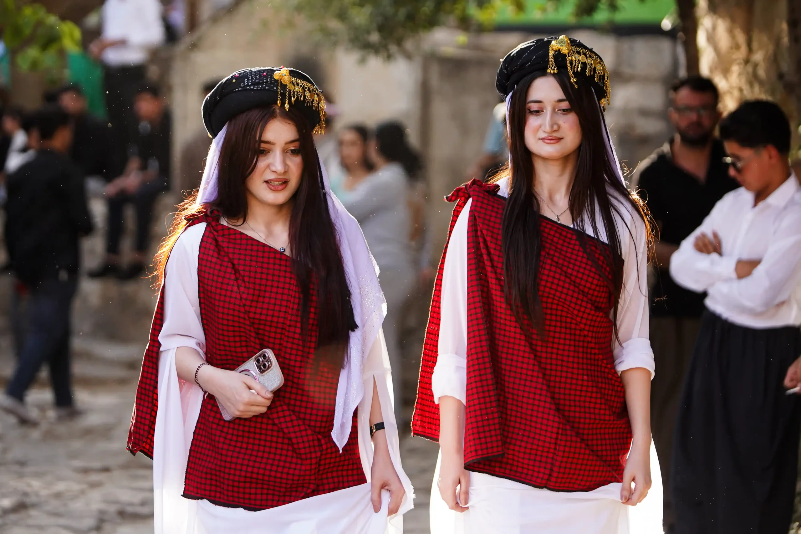 Yazidi girls in their traditional attires during a Yazidi festival
