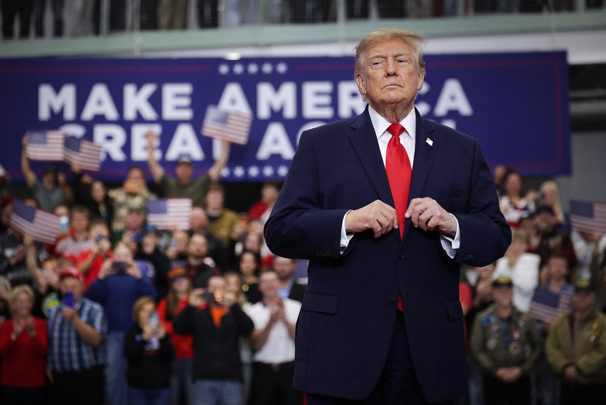 U.S. President Donald Trump arrives for a campaign rally at the Menard Memorial Sports Center on October 13, 2026 in Wasilla, Alaska.  (Photo by ALEX WONG / AFP)