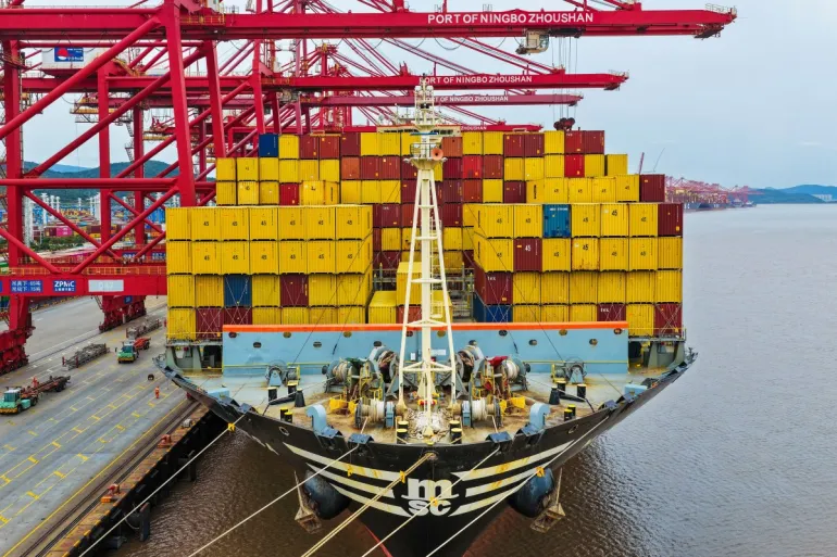 Containers are seen on a ship at the Ningbo-Zhoushan port in Ningbo in eastern China's Zhejiang Province on October 15, 2026 [AFP]
