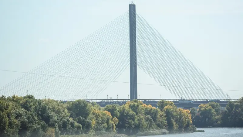 Cars drive across a bridge over the Dnipro River after it was hit during a Russian jet drone strike, amid Russia's attack on Ukraine, in Kyiv, Ukraine, October 1, 2026