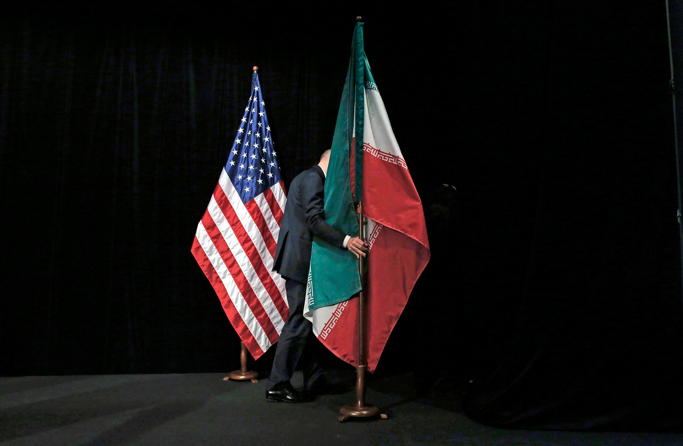 ئاڵای ئەمریکا و ئێران. فۆتۆ:AFP