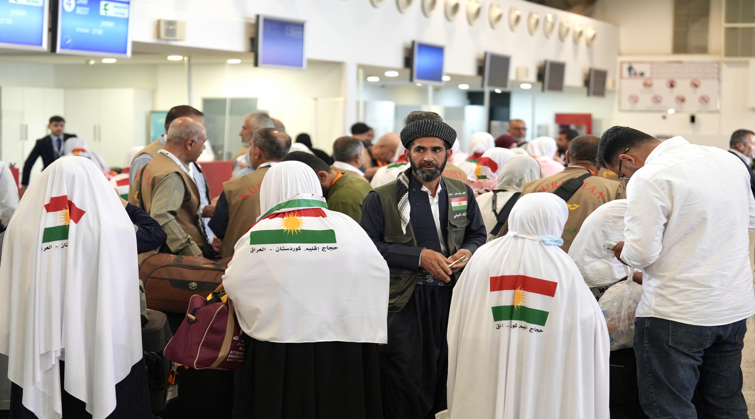 ژمارەیەک هاونیشتمانیی هەرێمى کوردستان لە فڕۆکەخانەى جەلال تاڵەبانى بۆ بەجێهێنانى فەریزەى حەج