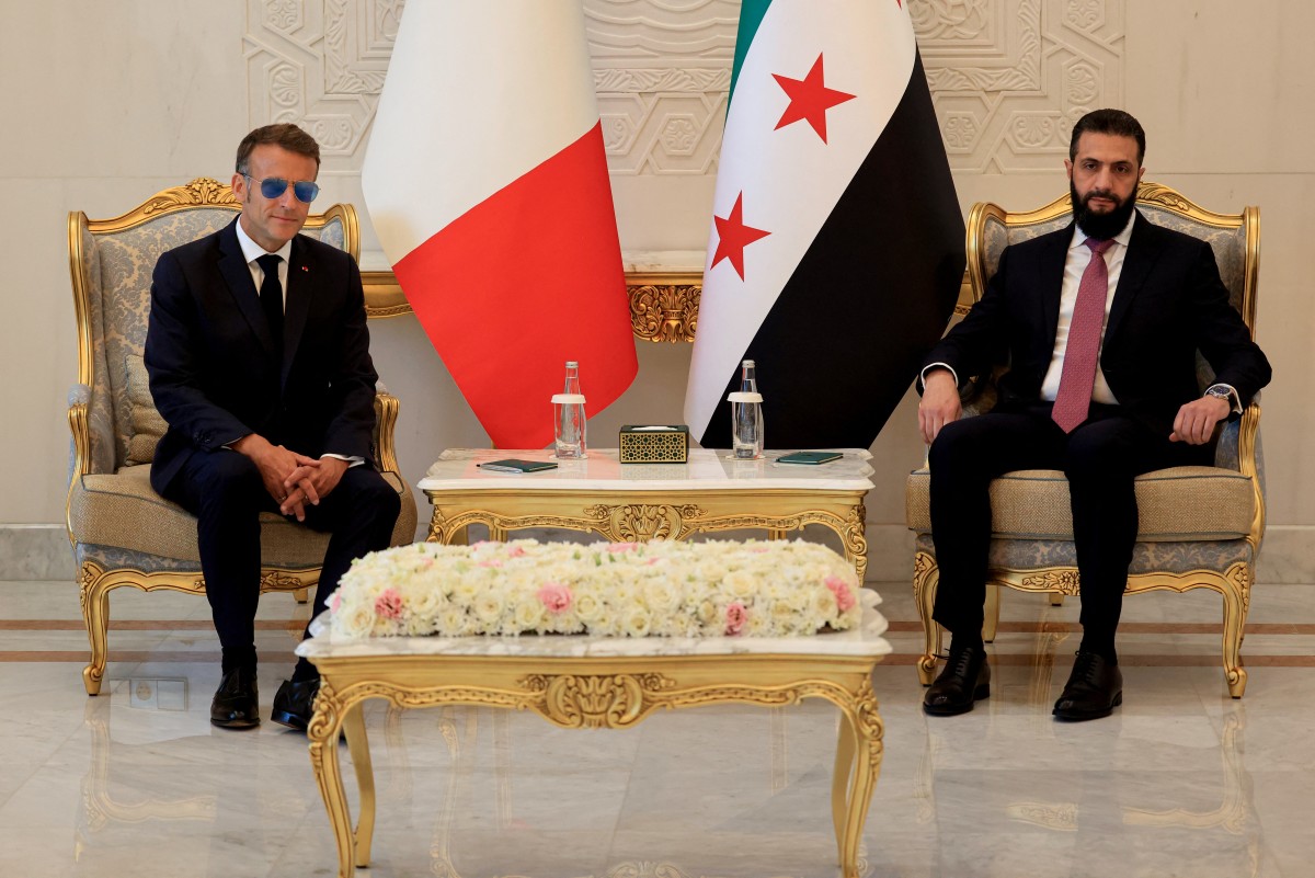 کۆبوونەوەی ئەحمەد شەرع و ئیمانوێل ماکرۆن لە دیمەشق. فۆتۆ: AFP