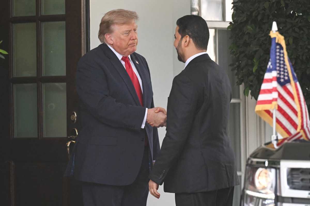 پێشوازی دۆناڵد ترەمپ، سەرۆکی ویلایەتە یەکگرتووەکانی ئەمریکا، لە عەلی فالح زەیدی، سەرۆکوەزیرانی عێراق. فۆتۆ: AFP