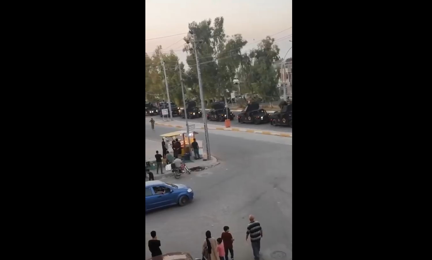 ژمارەیەک لە ئۆتۆمبێلەکانی دژەتیرۆری عێراق لەسەر شەقامی سەرەکی شارەدێی پردێی سەر بە شاری کەرکووک