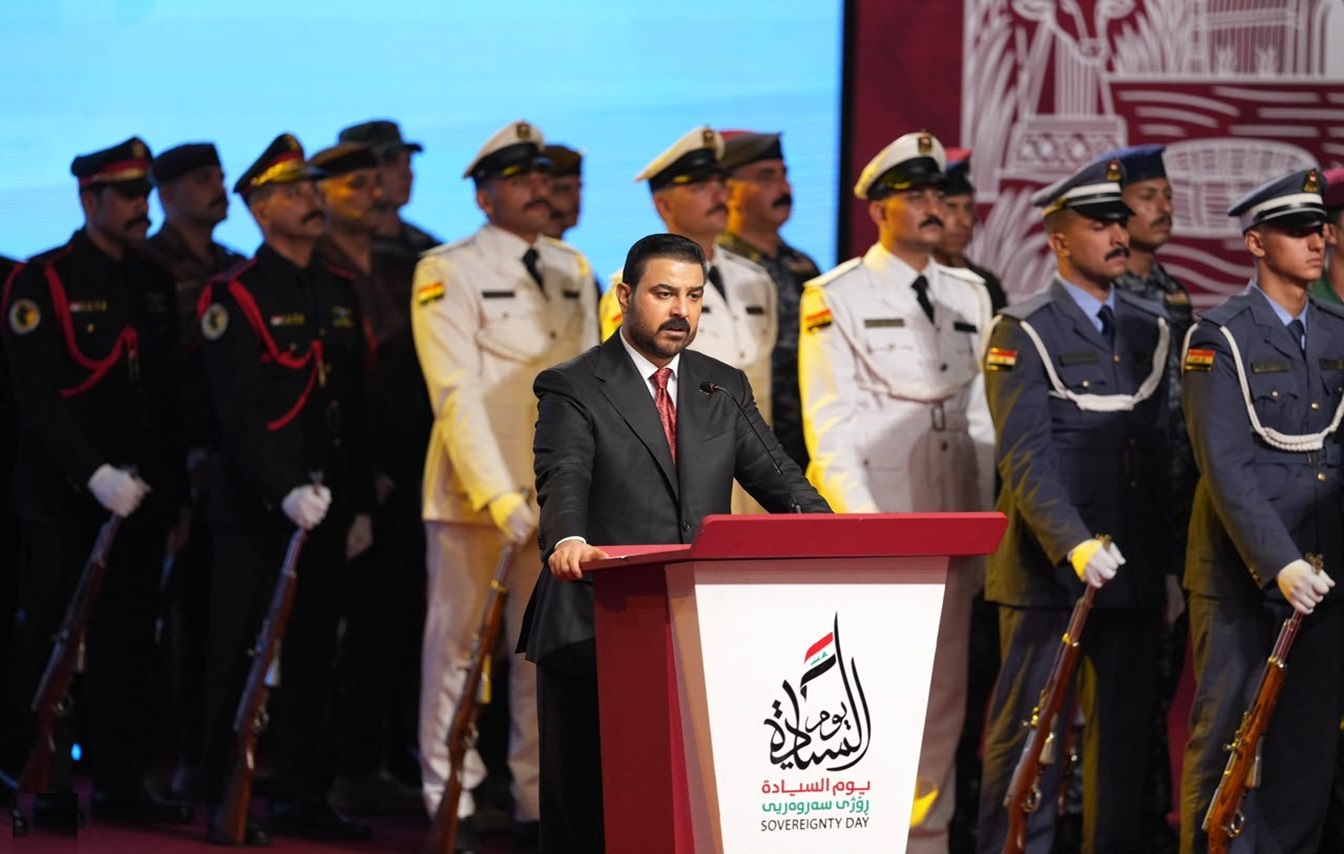 عەلى زەیدى، سەرۆکوەزیرانى عێراق لە میانى پێشکەشکردنى وتارى کۆنگرەى ڕۆژى سەروەرى