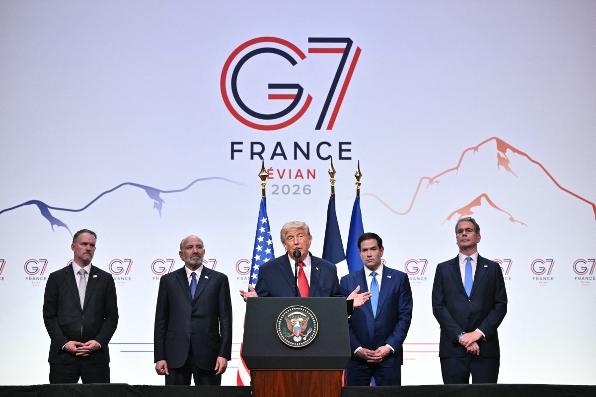 US President Donald Trump (C) gestures as he addresses the media alongside United States Trade Representative Jamieson Greer (L), US Commerce secretary Howard Lutnick (2L), US Secretary of State Marco Rubio (2R) and US Secretary of Treasury Scott Bessent during a closing press conference at the G7 summit, in Evian, eastern France, on June 17, 2026. A G7 summit is set to take place June 15 to 17 in the French town of Evian-les-Bains near Switzerland and it will be attended by country leaders as well as the EU's foreign policy chief and ministers from Brazil, Canada, the United Arab Emirates and Turkey. (Photo by Mandel NGAN / AFP)