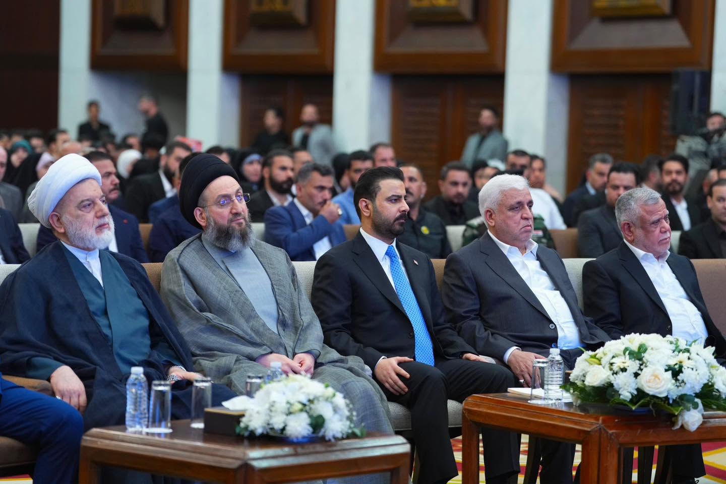 علی زیدی در حال شرکت در مراسم دوازدهمین سالروز تأسیس حشد الشعبی